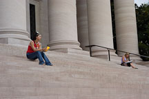 Women sitting on steps at the National Gallery of Art. Washington, D.C. - Photo #1868