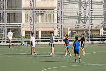 Boys playing soccer in Kowloon Park. Hong Kong, China. - Photo #14774