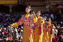Women from the Royal Academy of Performing Arts in a traditional folk dance. Thimphu tsechu, Bhutan. - Photo #22675