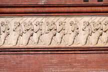 Facade of the National Building Museum depicting soldies marching with rifles. Washington, D.C., USA. - Photo #11182