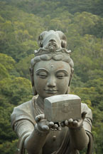 Buddhist statues praising the Tian Tan Budha. Lantau Island, Hong Kong, China. - Photo #16083