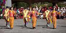 Dancers performing a traditional folk dance. Thimphu tsechu, Bhutan. - Photo #22685