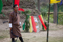 Archer wearing gho. Punakha, Bhutan. - Photo #23486
