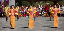 Female folk dancers in a line. Thimphu tsechu, Bhutan. - Photo #22686