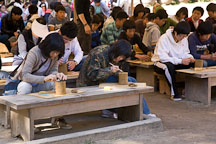 Korean students participate in a traditional pottery making class at the Korean Folk Village in Yong-in City. - Photo #20386