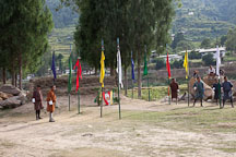 Archers waiting to see where their teammates will hit the target. Punakha, Bhutan. - Photo #23488
