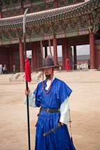 Guard with polearm at Gyeongbok Palace in Seoul, South Korea. - Photo #21090