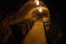 Wine barrels in underground storage. Napa Valley, California, USA. - Photo #4592