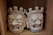 Unpainted masks with minature skulls. National Institute for Zorig Chusum, Thimphu, Bhutan. - Photo #22894