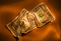 Crumpled dollar bill. - Photo #17197
