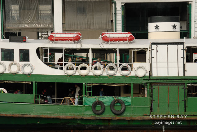 Close-up of Star Ferry docked at pier. Hong Kong, China.