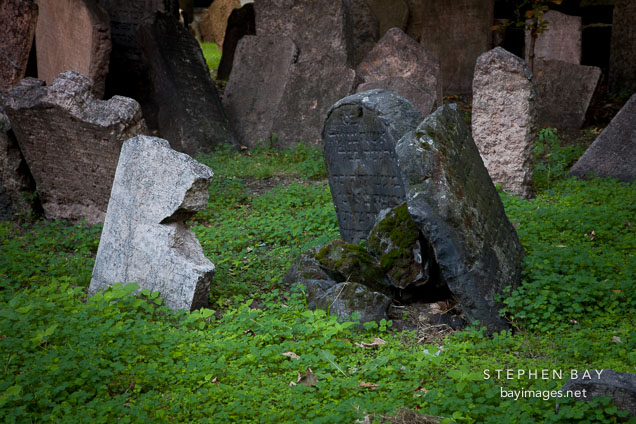 Crumbling gravestones in the Old Jewish Cemetery. Prague, Czech Republic