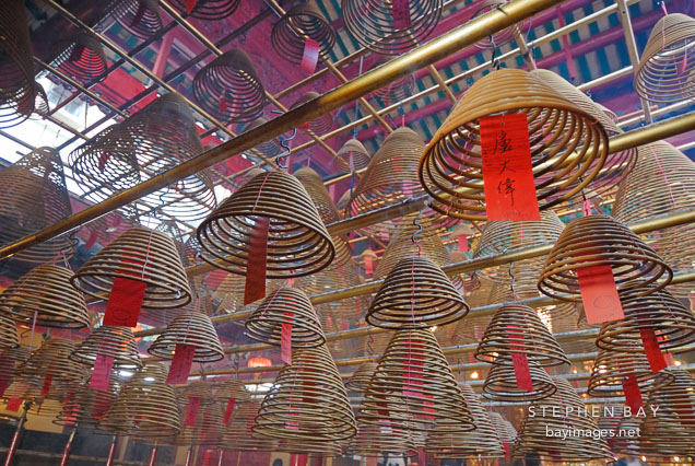 Hundreds of incense coils burn at Man Mo Temple. Hong Kong, China.