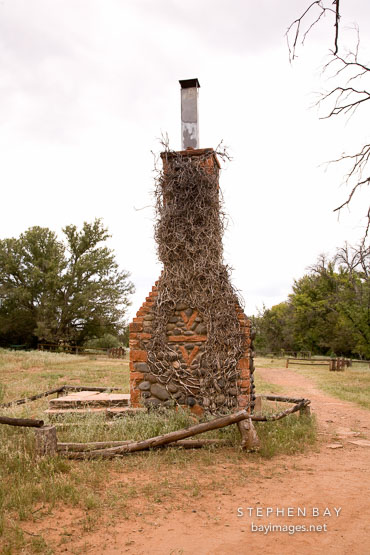 The chimney is all that remains of the original V-Bar-V ranch house. Arizona, USA.