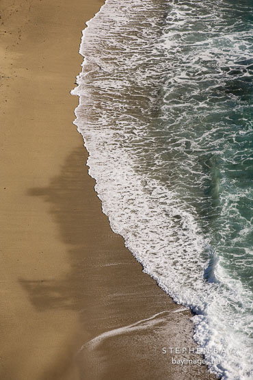 Waves hitting the shore at McWay Cove. Big Sur, California, USA.