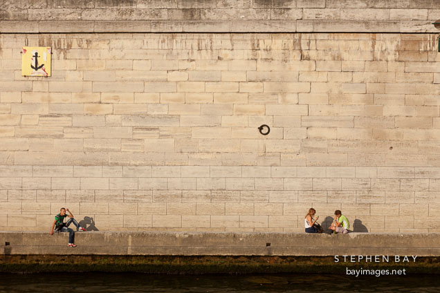 Parisians on the Seine. Paris, France.