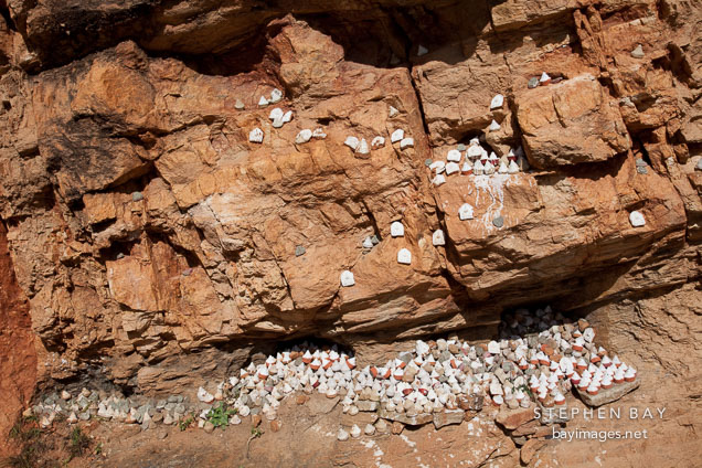 Hundreds of mini stupa are placed on rock faces at Sangaygang. Thimphu, Bhutan.