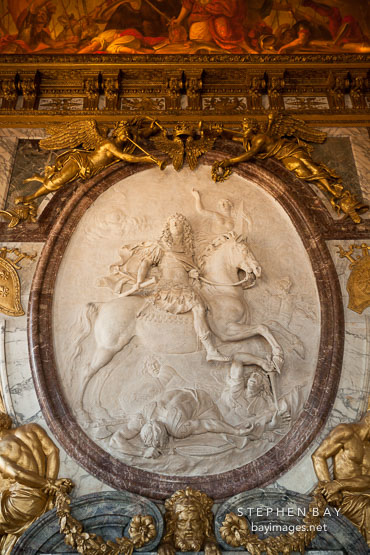 Marble relief of Louis XIV by Antoine Coysevox. Versailles, France.