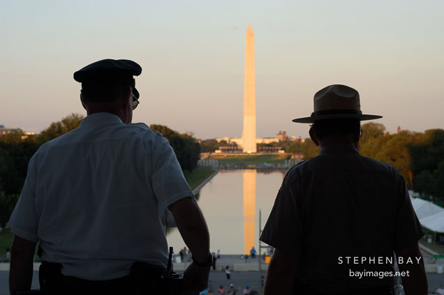 Photo: Silhouette of two park rangers. Washington Monument. Washington ...