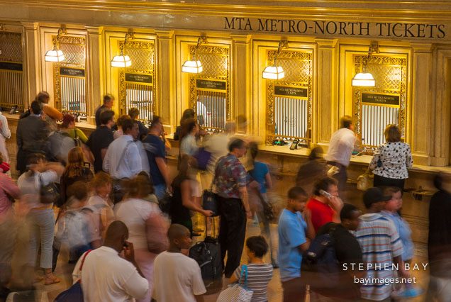 Passengers purchasing Metro North tickets. Grand Central Terminal, New York City, New York, USA.