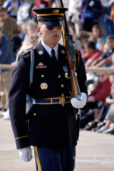 Soldier marching at the Tomb of the Unknowns, Arlington National Cemetery. Arlington, Virginia, USA.