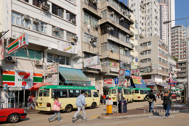 Buses waiting to pick up passengers. Aberdeen, Hong Kong, China.
