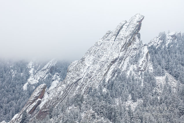 Third flatiron covered with a light dusting of snow. Boulder, Colorado