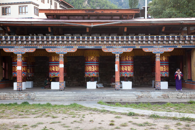 Row of prayer wheels at the National Memorial Chorten in Thimphu.