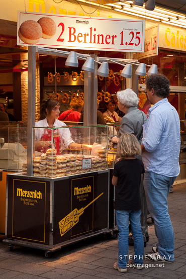 Selling Berliner doughnuts. Cologne, Germany.