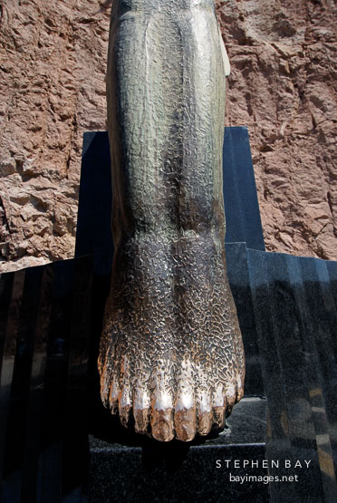 Rubbing the toes of the Winged figures brings good luck. Hoover Dam, Nevada and Arizona, USA.