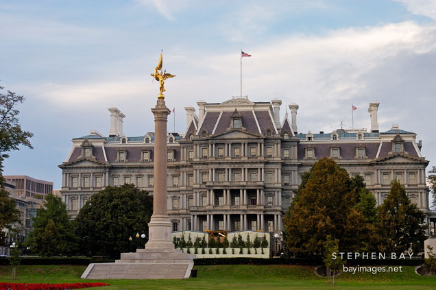 First Division Monument and the Dwight D. Eisenhower Executive Office Building. Washington, D.C., USA.
