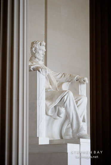 Statue of Abraham Lincoln framed by two columns. Lincoln Memorial, Washington, D.C., USA.