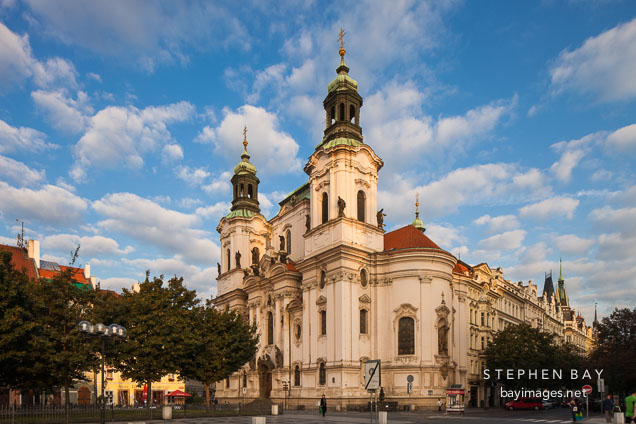 Sunrise on Saint Nicholas Church in Old Town Square. Prague, Czech Republic.