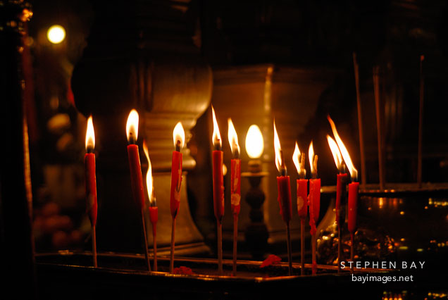 Lit candles. Man Mo Temple, Hong Kong, China.