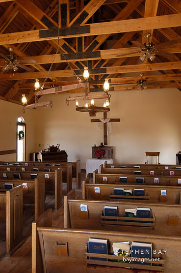 Benches inside the chapel. Goldfield, Phoenix, Arizona, USA.