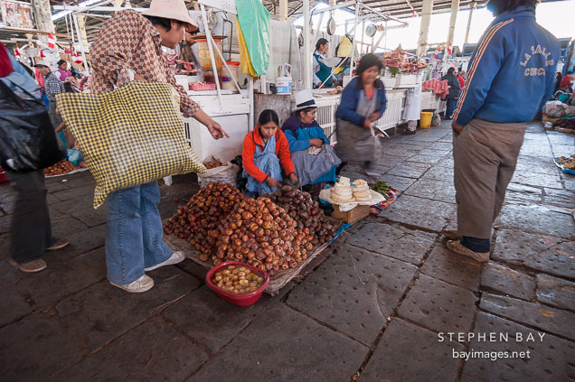 Selling produce in the central market. Cusco, Peru.