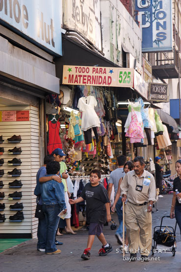 Downtown sidewalk and stores. Los Angeles, California, USA.