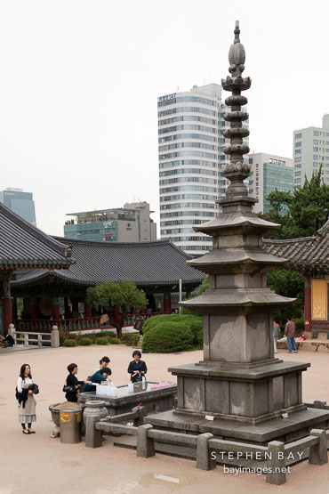 This stone pagoda is located in front of the Daewoongjeon main temple at Bongeunsa Buddhist Temple in Seoul, South Korea.