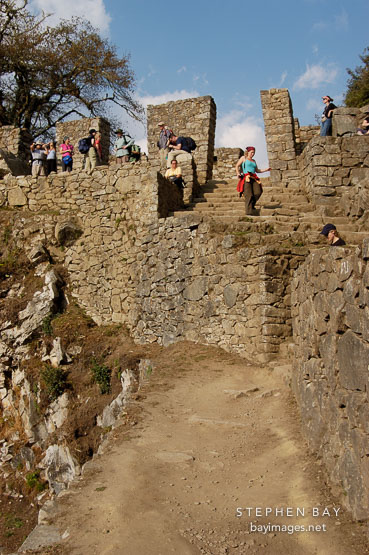 Tourists at Intipunku. Gate of the Sun. Inca trail, Peru.