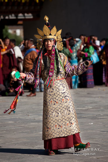 Dancer with ornate dress. Thimphu tsechu, Bhutan.