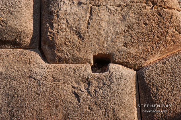 Drainage hole. Sacsayhuaman. Peru.