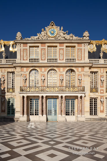 Marble court and Palace of Versailles. Versailles, France.