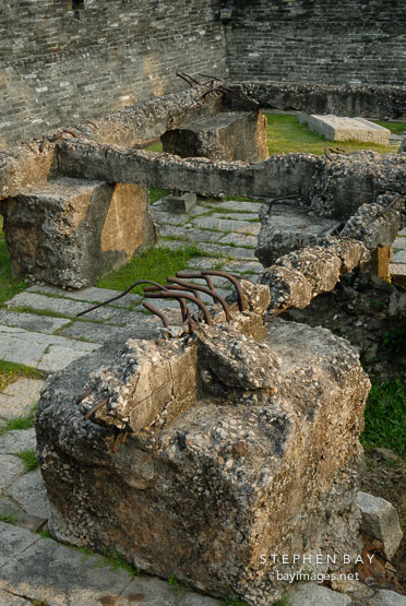 All that remains of the South Gate is concrete rubble. Kowloon walled city park. Hong Kong.