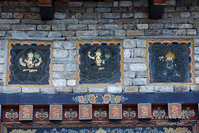 Slate carvings above the entrance to the National Memorial Chorten. Thimphu, Bhutan.