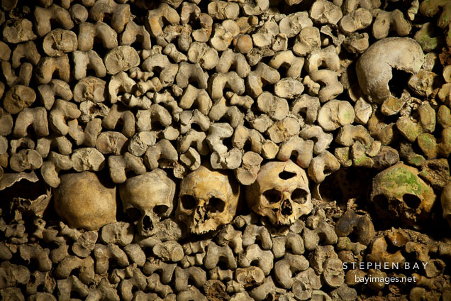 Stacked human remains in the Paris catacombs. Paris, France.