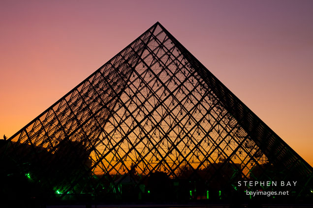 Louvre pyramid at sunset. Paris, France.
