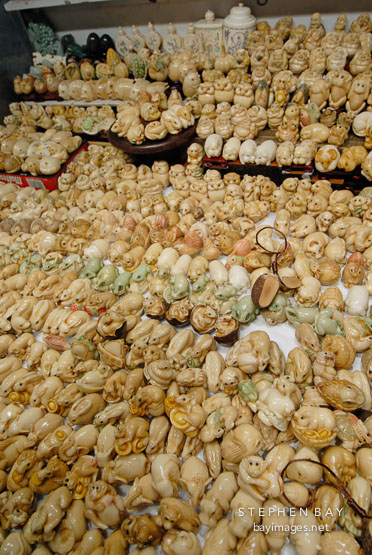 Tagua nut animal carvings. Jade Market, Yau Ma Tei, Hong Kong, China.