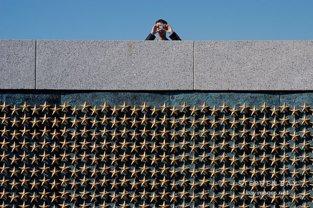 Visitor at the National World War II Memorial. Washington, D.C., USA.