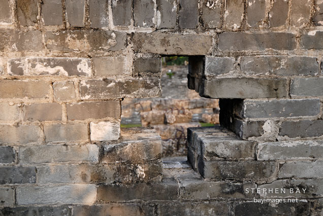 Cross shaped window (south gate remnant). Kowloon walled city park. Hong Kong.