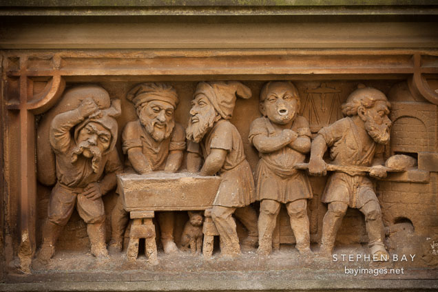 Heinzelmannchen fountain with gnomes baking bread. Cologne, Germany.